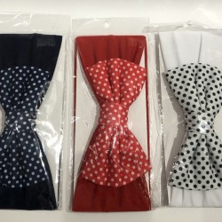 VALERINA, ancha con un MOÑO, con puntos grandes